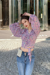 Blusa de gasa con volantes y estampado floral de manga larga